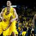 Michigan sophomore Trey Burke and freshman Mitch McGary celebrate after defeating Michigan State 58-57 on Sunday, Mar. 3. Daniel Brenner I AnnArbor.com